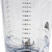 A clear Hamilton Beach polycarbonate blender jar with black measurements.