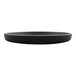 A close up of a GET Roca black melamine round plate with a circular rim.