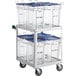 A metal cart with clear plastic containers on it.