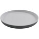 A white GET Roca melamine plate with a rim.