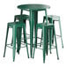 A Lancaster Table & Seating emerald green table with four barstools.