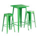 A jade green table with two backless barstools.