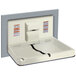 An American Specialties, Inc. stainless steel recessed horizontal baby changing station with a white rectangular lid.