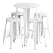 A Lancaster Table & Seating pearl white table with four backless barstools with white seats.