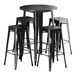 A Lancaster Table & Seating black metal table with four black backless barstools.