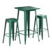 A Lancaster Table & Seating emerald green table with two barstools.