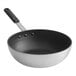 An 11-inch aluminum non-stick stir fry pan with a black silicone handle.
