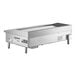 A Cooking Performance Group electric countertop griddle with a stainless steel rectangular surface.