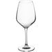 An Acopa Radiance clear wine glass with a long stem.