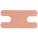 A close-up of a Medique woven knuckle bandage with two holes in it.