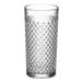 A close-up of an Acopa Aurelius clear beverage glass with a diamond pattern.