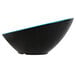 A black melamine bowl with a blue rim.