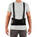 A man wearing an Ergodyne ProFlex back support brace with straps.