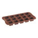 A brown silicone chocolate mold with 15 square compartments.