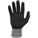 A black and gray Ergodyne ProFlex warehouse glove with a gray palm.