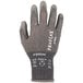 A medium-sized Ergodyne ProFlex warehouse glove with polyurethane palm coating and white text on it.