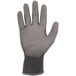 A gray Ergodyne ProFlex cut resistant glove with a black polyurethane palm coating.
