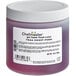 A container of Chefmaster Deep Pink gel food coloring on a counter.