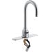 A silver Waterloo deck mount sensor faucet with a gooseneck spout and deck plate.