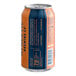 A close up of an Athletic Brewing Co. Free Wave Non-Alcoholic Hazy IPA can with blue and orange text on an orange label.