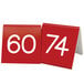 A red table number with white numbers on it.