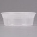 A clear Pactiv deli container with a white lid.