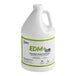 A white Noble Eco bottle with a green label for 1 gallon of EDM+ drain maintainer.