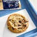 A Christie Cookie Co. triple chocolate blonde cookie in a package.