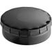 A black round metal tin with a push and pop cover.