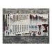 Triton DuraBoard with hooks and bins on a white wall with tools.