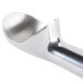 A close-up of a Zeroll aluminum ice cream scoop with a metal spoon.