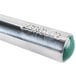 A close-up of a Zeroll aluminum ice cream scoop with a green ball on the end of a metal rod.