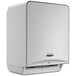 A white rectangular Kimberly-Clark Professional ICON automatic paper towel dispenser with a silver patterned faceplate.