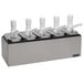 A San Jamar stainless steel condiment pump service center with five wells.