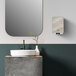 A Kimberly-Clark Professional ICON automatic soap dispenser with a warm marble faceplate above a white bathroom sink.