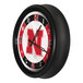 A round wall clock with a black frame featuring the University of Nebraska logo and LED lighting.