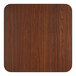 A square, reversible walnut laminated bar height table top with rounded corners.