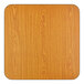 A square, oak-colored laminated tabletop with rounded corners.