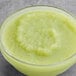 A bowl of Les Vergers Boiron Green Apple fruit puree.