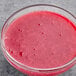 A glass bowl of Les Vergers Boiron redcurrant puree.
