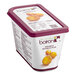 A white plastic tub of Les Vergers Boiron Mirabelle Plum 100% Fruit Puree with a purple lid.