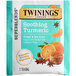 A Twinings Soothe Turmeric, Orange & Star Anise tea bag with orange and anise on the packaging.