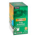 A green and yellow box of Twinings Irish Breakfast Tea K-Cup Pods with a picture of a house.