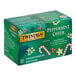 A green Twinings Peppermint Cheer tea box with white and red text.