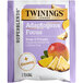 A purple and white box of Twinings Focus Ginseng, Mango & Pineapple Herbal Tea Bags.