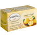 A yellow box of Twinings Lemon & Ginger Herbal Tea Bags.