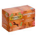 A box of Twinings Gingerbread Joy Tea Bags with gingerbread men and spices on the front.