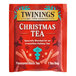 A red Twinings Christmas tea packet with white and black text.