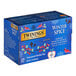 A blue box of Twinings Winter Spice Herbal Tea Bags with designs and text.