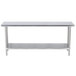 A stainless steel rectangular work table with a stainless steel shelf.